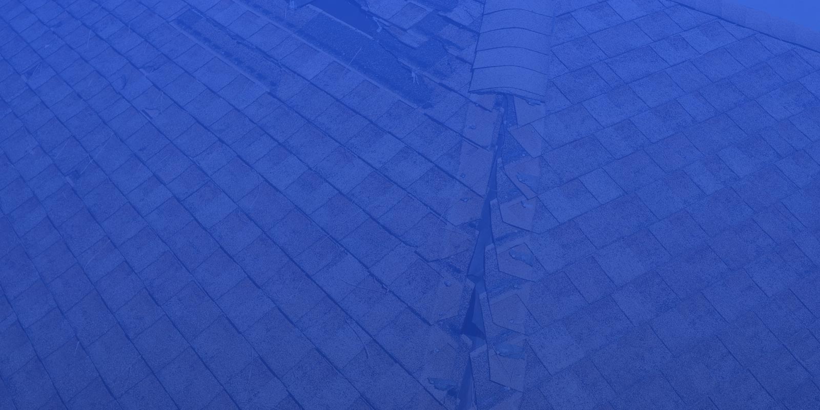blue overlay with roof in background